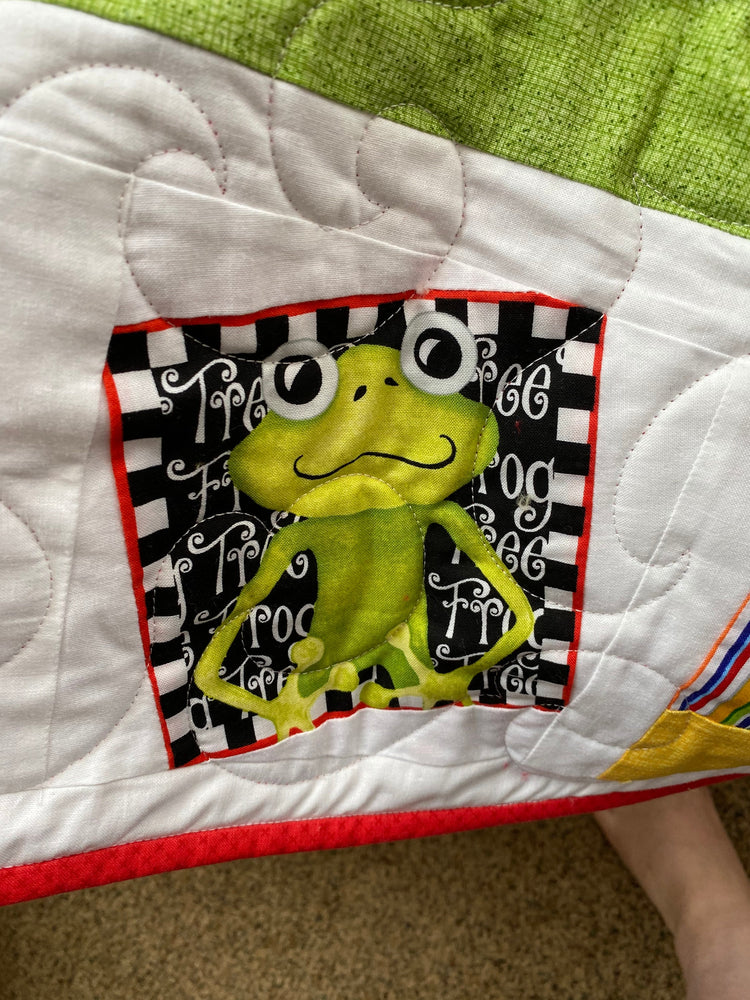 Wonky Strip Quilt for a boy or girl with a plush red minky back