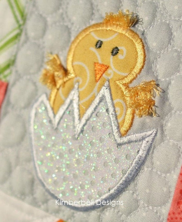 The “HOPPY" Easter Bench Pillow Machine Embroidery CD by Kimberbell Designs