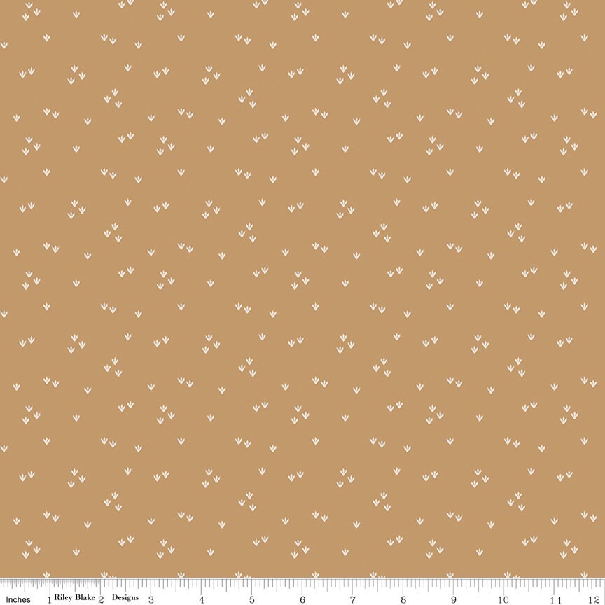 Cretaceous Scattered Footprints Tan by Amanda Niederhauser for Riley Blake Designs - C14105-TAN