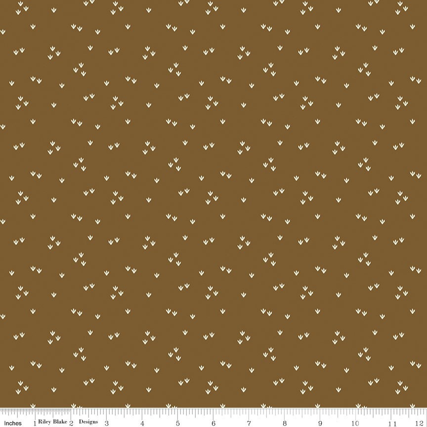 Cretaceous Scattered Footprints Brown by Amanda Niederhauser for Riley Blake Designs - C14105-BROWN